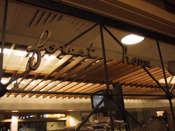 [Inside it was both beautiful and a bit tough to navigate. There was a security camera TV that you could see behind this lovely metal work as you entered. The building was bustling and noisy, most patrons were speaking in Spanish. It was old and cozy and boxy and dark and we loved it.
]