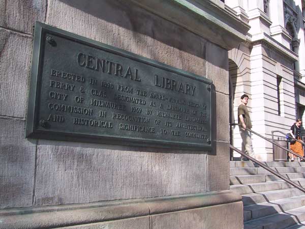 [The <a href=http://www.mpl.org/files/BRANCH/central.htm>Central Library</a> was the last one we visited. We had been there once earlier in the week but hadn't gotten past the booksale and the beautiful entryway. I stopped in to see Susan who is a media librarian who also reads librarian.net. I told her my stories and she apologized for the zillion degree library -- apparently they don't turn on the air conditioning until May, even if the temperature approaches ninety as it did that day.
]