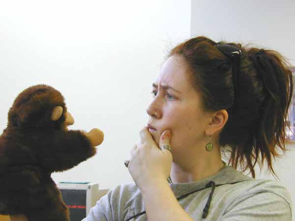 [Many of the libraries had puppets available for checking out, or playing with inside the library. This monkey told jokes.<P>'So this mushroom walks into a bar and the bartender says 'get out of here, we don't serve your kind here' and the mushroom says, 'hey, why not? I'm a fun guy!''
]