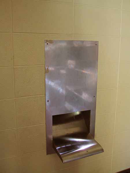 [Here is a view of the aforementioned book drop. Looks more like a place to sit than a portal for books, no?
]